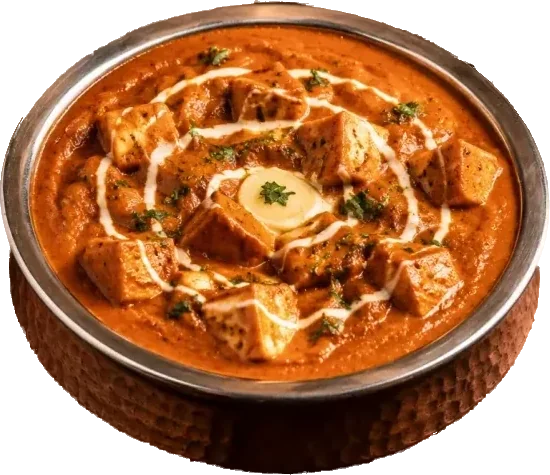 Paneer butter masala in a copper handi